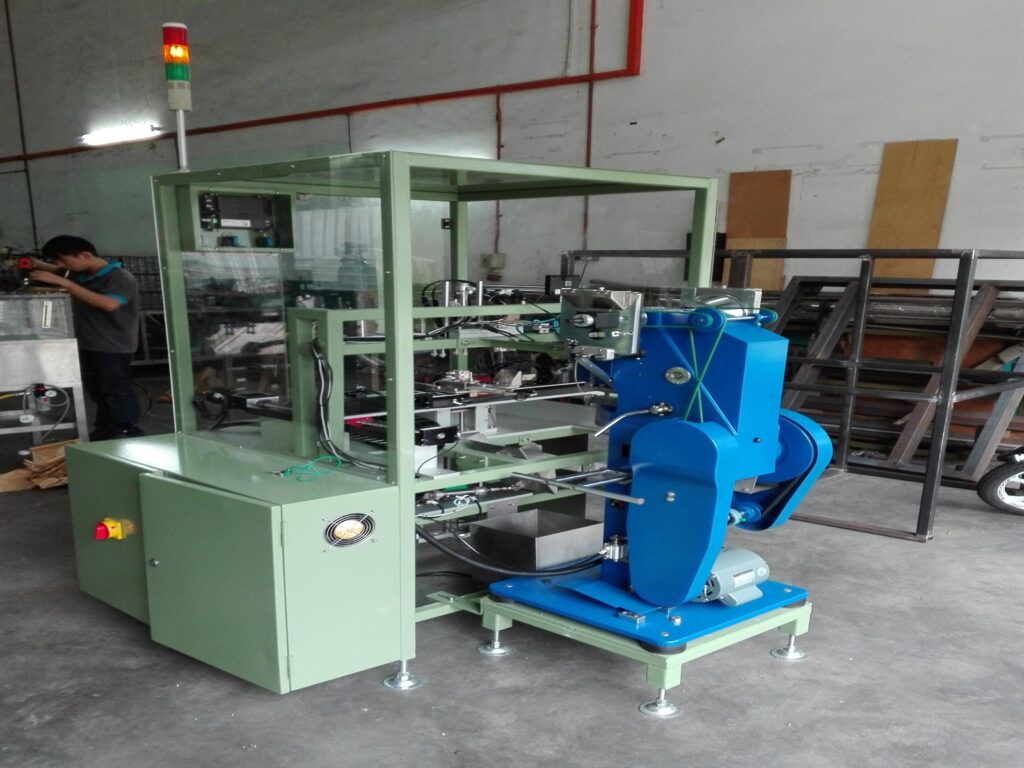 Pure Automation - Snap Fastener Assembly for Textile & Garments Manufacturing with Industrial Automation System