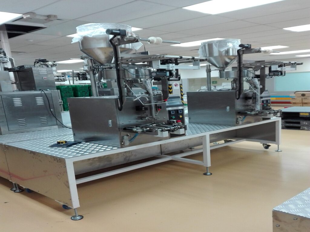 Pure Automation - Volumetric Packaging System for Food & Beverage Manufacturing with Industrial Automation System